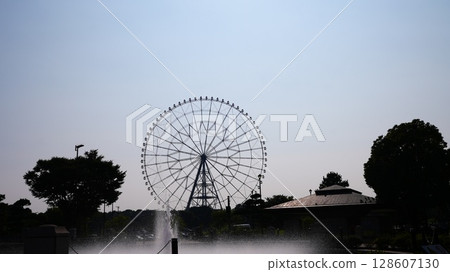 The Ferris wheel and fountain at Kasai Rinkai Park The Ferris wheel and fountain at Kasai Rinkai Park 128607130