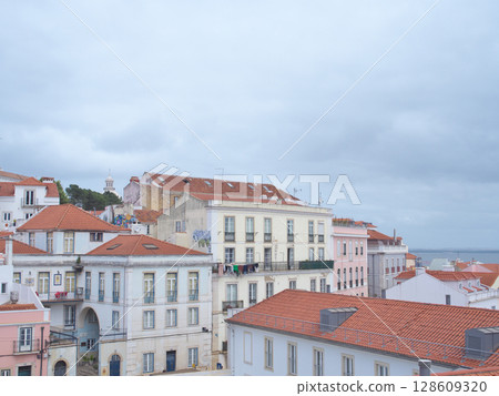 Portugal, Lisbon, streetscape near São Jorge Castle, May evening 128609320