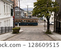 [Passenger advertisements blurred] A streetcar passing through Hakodate Daisanzaka, Suehirocho, Hakodate City 128609515