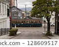 [Passenger advertisements blurred] A streetcar passing through Hakodate Daisanzaka, Suehirocho, Hakodate City 128609517