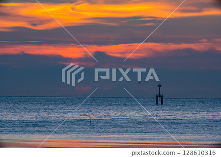 Golden Sunset Over the Ocean Golden Sunset Over the Ocean 128610316