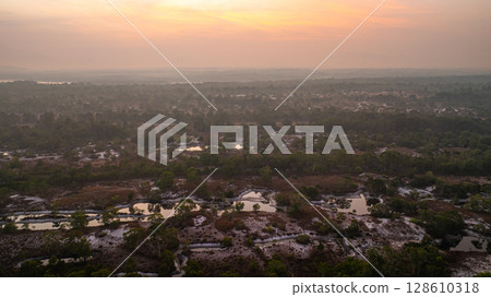 Aerial view of Scenic Sunrise Over Misty Savanna Landscape Aerial view of Scenic Sunrise Over Misty Savanna Landscape 128610318