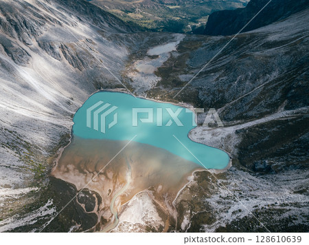 Aerial view of beautiful lake in high altitude mountains landscape Aerial view of beautiful lake in high altitude mountains landscape 128610639