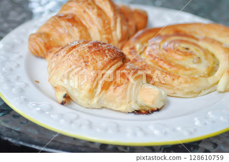 croissant ,French croissant or chocolate croissant or French bread and danish or danish pastry croissant ,French croissant or chocolate croissant or French bread and danish or danish pastry 128610759