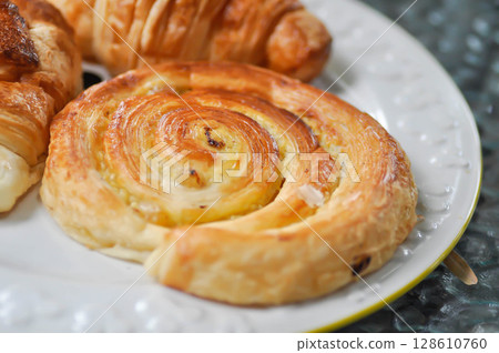 danish or danish pastry dish and croissant ,French croissant or French bread 128610760