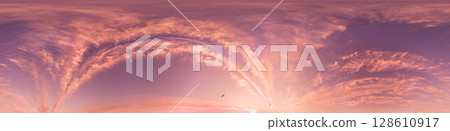 Sunset sky with bright glowing pink Cirrus clouds. Seamless spherical HDR 360 panorama. Full zenith or sky dome in 3D, sky replacement for aerial drone panoramas. Climate and weather change. 128610917