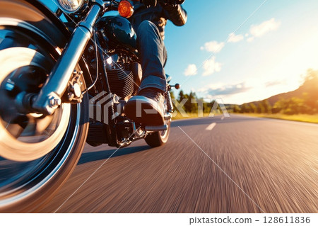 Close-Up of Riders Wearing Boots on Motorbikes 128611836