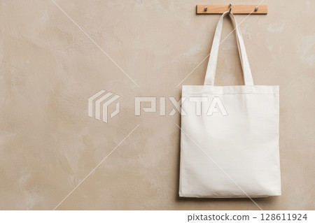 Minimalist White Tote Bag on Wooden Hook Minimalist White Tote Bag on Wooden Hook 128611924