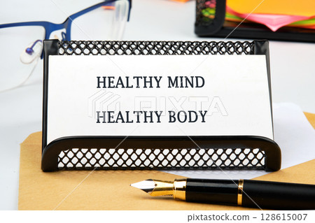 The concept phrase is HEALTHY MIND HEALTHY BODY. The concept of beauty and health. Physical activity for body and mind relaxation, healthy lifestyle habits concept The concept phrase is HEALTHY MIND HEALTHY BODY. The concept of beauty and health. Physical activity for body and mind relaxation, healthy lifestyle habits concept 128615007
