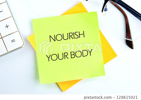 The concept phrase NOURISH YOUR BODY. The concept of beauty and health The concept phrase NOURISH YOUR BODY. The concept of beauty and health 128615021