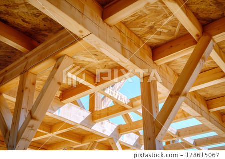 Newly house is under construction interior framing is already complete truss beams frame system are being installed Generative AI 128615067