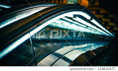 Escalator at night, urban scene 128616477