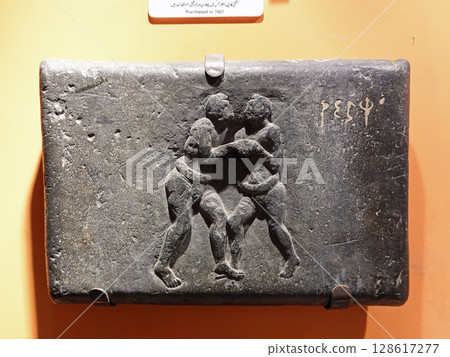 Sculptures depicting scenes from the life of the Buddha on display at the Peshawar Museum in Pakistan, the capital of Gandhara Sculptures depicting scenes from the life of the Buddha on display at the Peshawar Museum in Pakistan, the capital of Gandhara 128617277