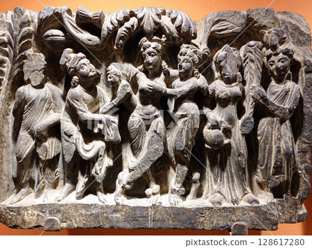 Sculptures depicting scenes from the life of the Buddha on display at the Peshawar Museum in Pakistan, the capital of Gandhara 128617280