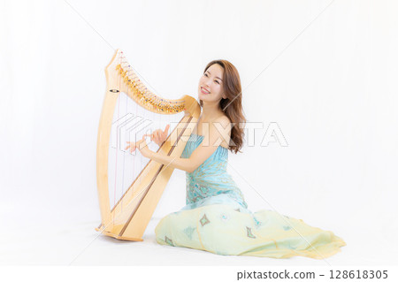 A young woman who likes small herbs and music A young woman who likes small herbs and music 128618305