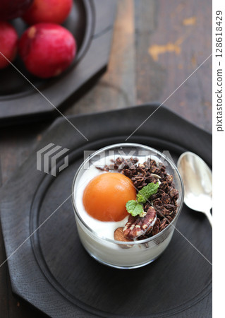 Granola and apricot yogurt Granola and apricot yogurt 128618429