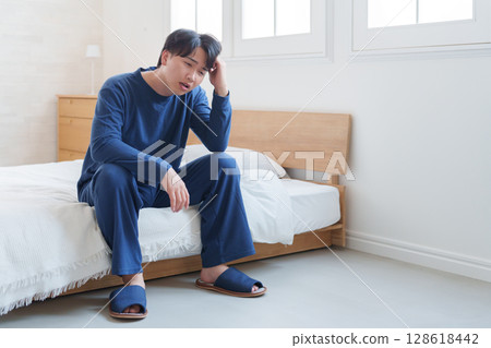 A man in poor physical condition A man in poor physical condition 128618442