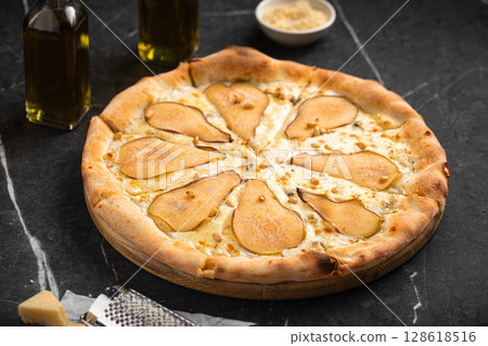 Gourmet pear and cheese pizza with crispy crust 128618516