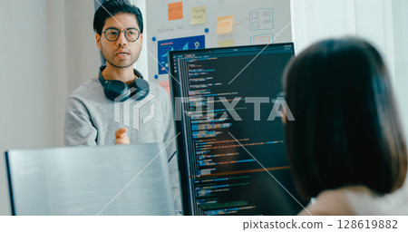 Group adult Asia male female software developers mentor leader manager talk strategy plan to executive write prompt AI bot IT app program nomad, video game, data center. Whiteboard slideshow code. 128619882