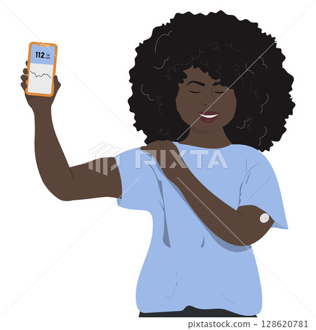 African american diabetic woman with continuous glucose monitor on her arm.  128620781