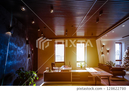 Office room with blank computer display,table,chair,cement floor,glass walls with night city view. Mixed media . 128622780