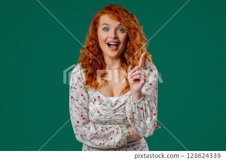 Breakthrough Genius Idea. Happy Ginger Woman Eureka Moment,Pointing Finger Up Breakthrough Genius Idea. Happy Ginger Woman Eureka Moment,Pointing Finger Up 128624339