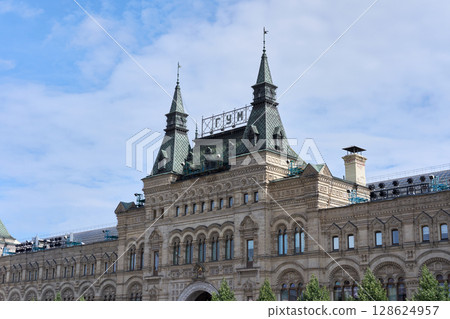 Historic GUM Department Store Facade on Red Square in Moscow Featuring Neo-Russian Stone Arches and Turreted Roofline 128624957