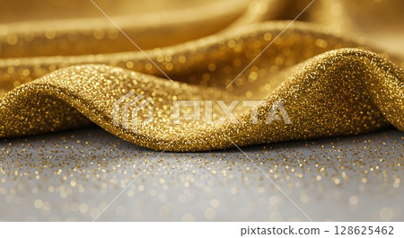 golden glitter on glitter background 128625462