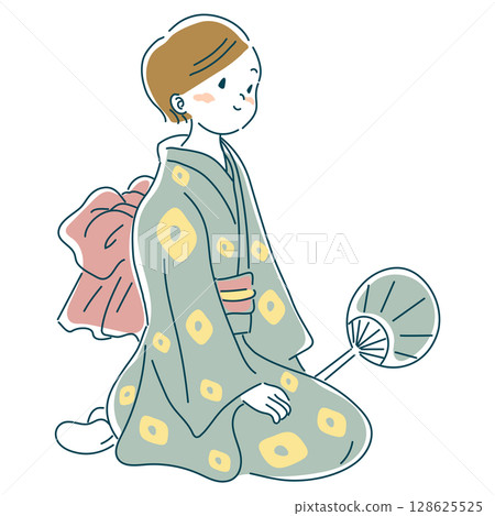 A woman in a yukata holding a fan 128625525