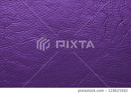 Close up, macro texture of purple glossy natural genuine leather, leatherette structure 128625882