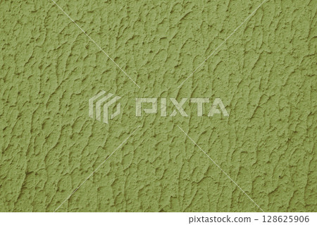 Rough khaki colored concrete or plaster wall texture background Rough khaki colored concrete or plaster wall texture background 128625906