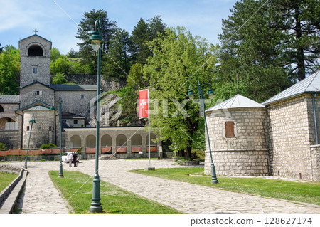 Cetinje, Montenegro - 05.06.2025: Monastery of the historic and presidential capital of country Cetinje, Montenegro - 05.06.2025: Monastery of the historic and presidential capital of country 128627174