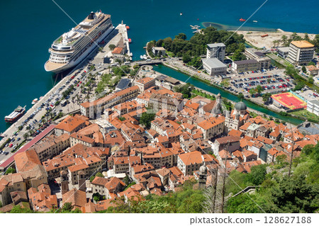 high angle over Kotor old town buildings and sea bay. Montenegro, Europe high angle over Kotor old town buildings and sea bay. Montenegro, Europe 128627188