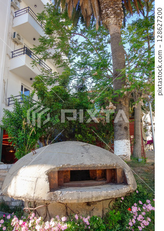 Typical bunker or casemate from communist era in Saranda, Albanian coast 128627200