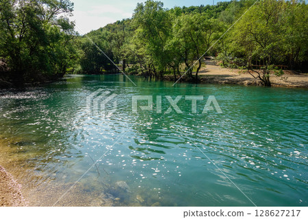 Neretva river flowing down through the landscape in Bosnia Herzegovina, balcan peninsula, Europe Neretva river flowing down through the landscape in Bosnia Herzegovina, balcan peninsula, Europe 128627217