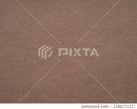 A textured expanse of warm earthy tones evokes a sense of organic simplicity and tactile comfort. 128627221