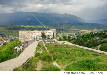 view from the upper area of Gjirokaster castle in Albania, and mountainscape as backdrop view from the upper area of Gjirokaster castle in Albania, and mountainscape as backdrop 128627283
