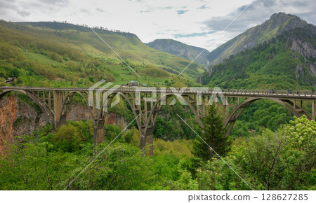 panoramic of Durdevica Tara Bridge, concrete arch bridge over Tara River in northern Montenegro, Europe 128627285