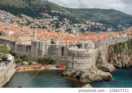 panoramic of Dubrovnik West Harbour, in Croatia. Castle walls and bastion on background 128627311
