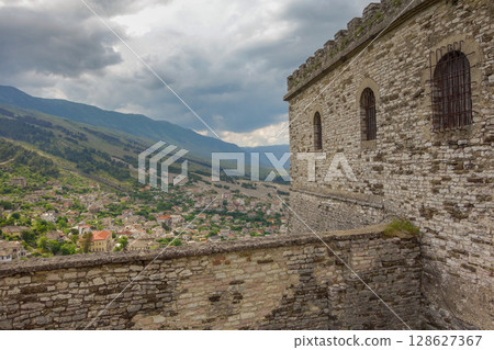 view from the upper area of Gjirokaster castle in Albania, and cityscape as backdrop 128627367