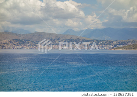 panoramic view of Albanian riviera coastline, Saranda city on background panoramic view of Albanian riviera coastline, Saranda city on background 128627391