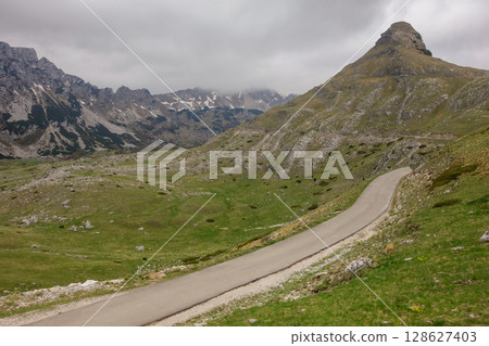 panoramic view in Durmitor National Park, Zabljak, Montenegro, crossing road P14 panoramic view in Durmitor National Park, Zabljak, Montenegro, crossing road P14 128627403