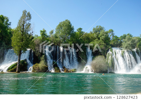 big cascades of Kravica waterfall in Trebizat river, in Bosnia and Herzegovina, Southeast Europe big cascades of Kravica waterfall in Trebizat river, in Bosnia and Herzegovina, Southeast Europe 128627423