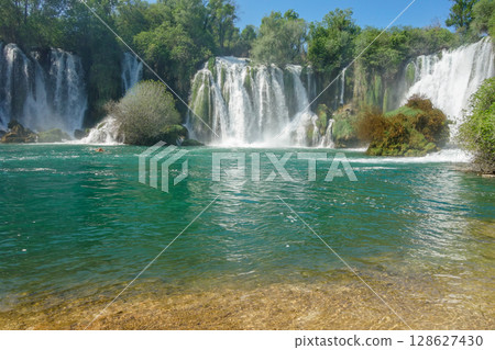 big cascades of Kravica waterfall in Trebizat river, in Bosnia and Herzegovina, Southeast Europe big cascades of Kravica waterfall in Trebizat river, in Bosnia and Herzegovina, Southeast Europe 128627430