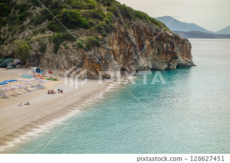 panoramic of Gjipe Beach in Dhermi, Albanian riviera, Ionian sea 128627451
