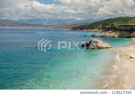 stunning Pulebardha Beach in Ksamil, Albania. Saranda city on background 128627495
