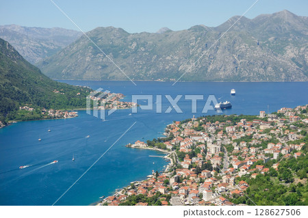 splendid bay of Kotor in Montenegro coast. Aerial view of fjord and cityscape splendid bay of Kotor in Montenegro coast. Aerial view of fjord and cityscape 128627506