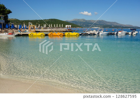pedal boats on the beach in Ksamil, Albanian rivieira, Ionian sea coastline 128627595