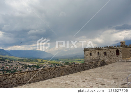 view from the upper area of Gjirokaster castle in Albania, and cityscape as backdrop view from the upper area of Gjirokaster castle in Albania, and cityscape as backdrop 128627706