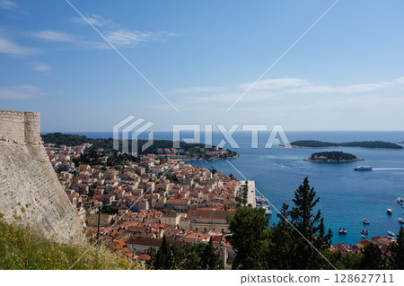panoramic view of the ancient town of Hvar on the Adriatic coast of Croatia, from the fort panoramic view of the ancient town of Hvar on the Adriatic coast of Croatia, from the fort 128627711